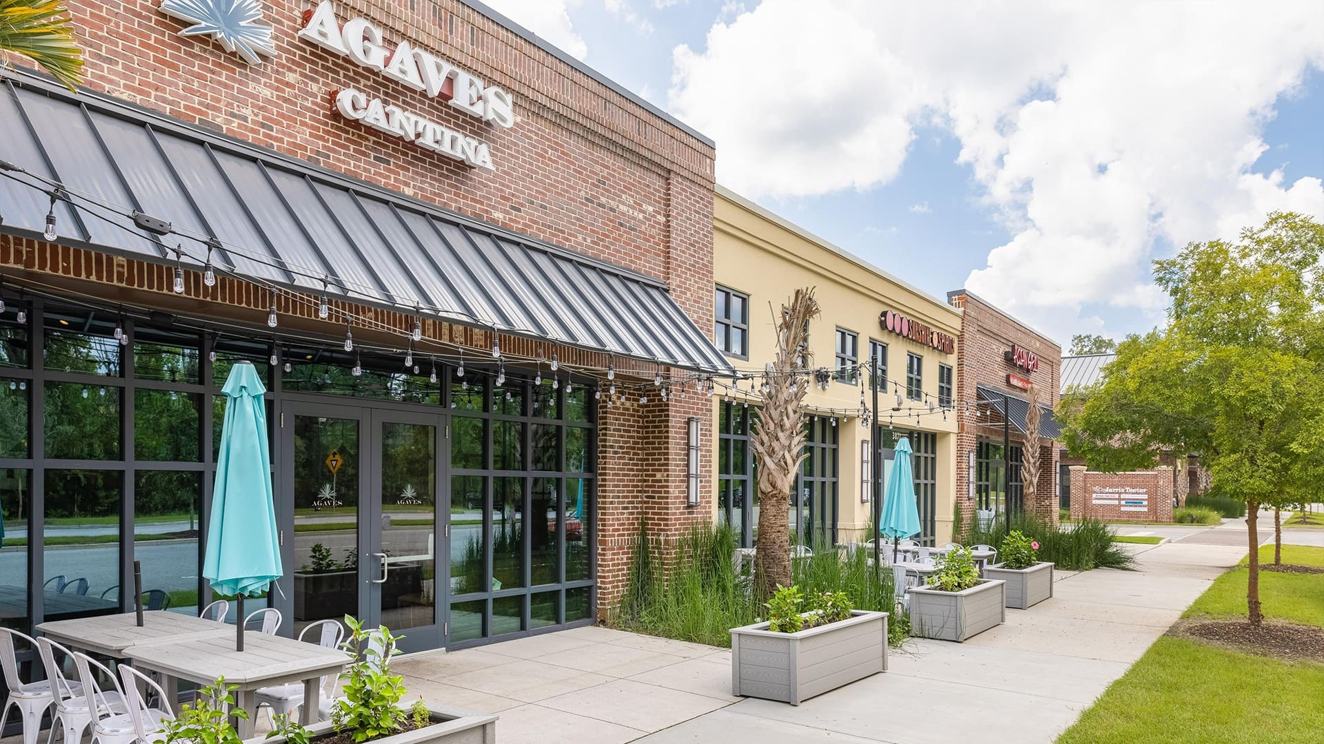 Shops and restaurants at West Ashley Circle near Grand Oaks Plantation