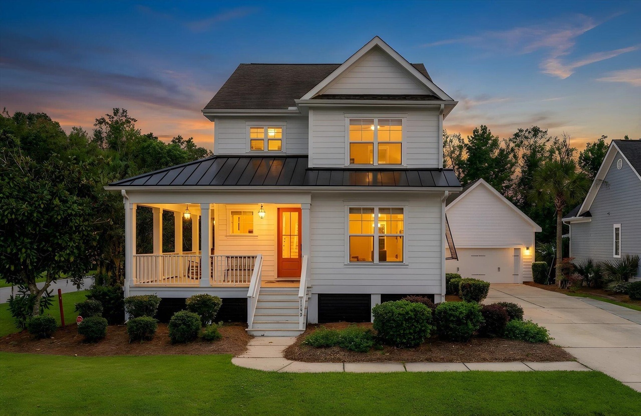 Hunt Club porch-front home at dusk
