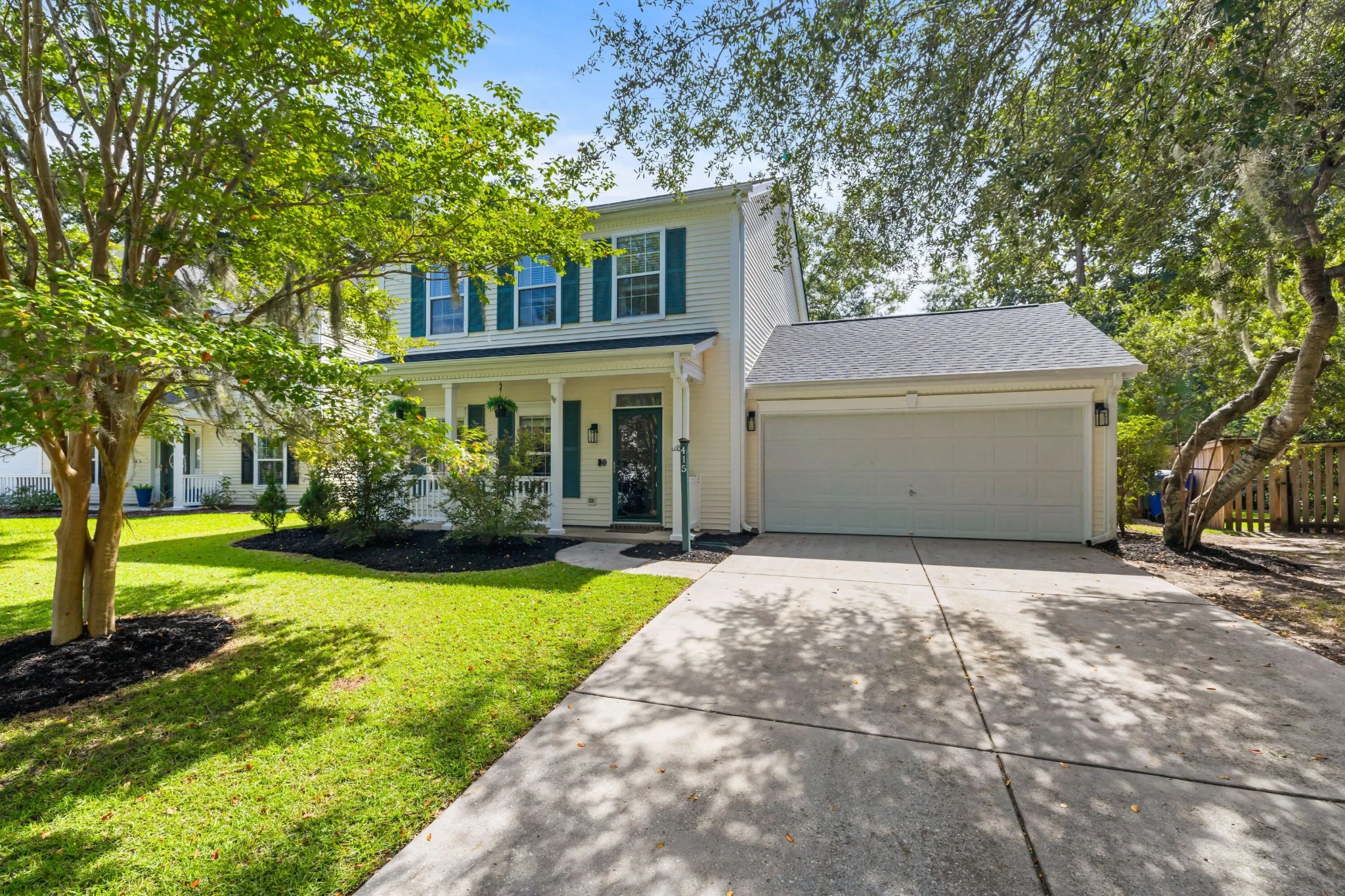 Two-story home on a tree-lined Village Green street