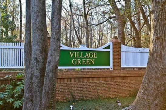 Village Green neighborhood entrance sign